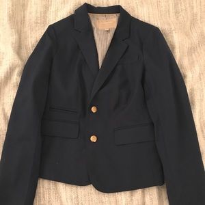 Navy blue blazer with gold buttons